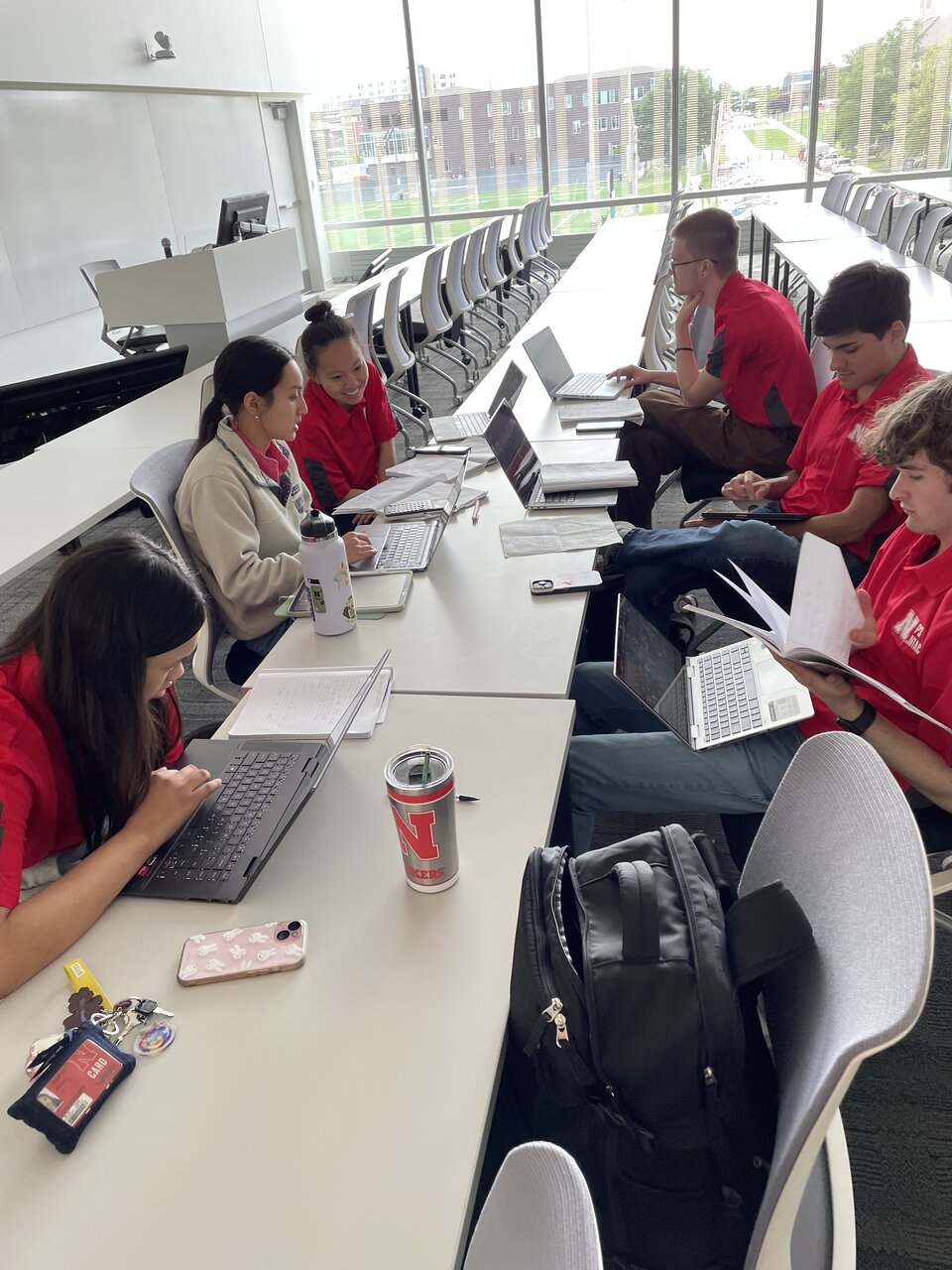 Students going over content for a preliminary meeting